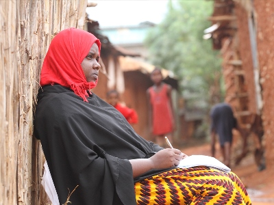 A lady in the midst of Voi